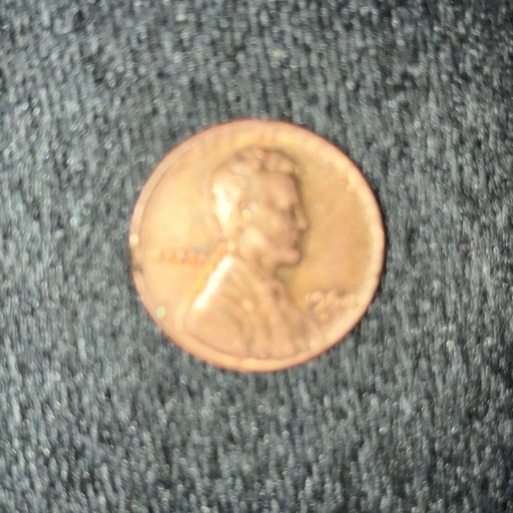 1964 penny slight scratches on the back